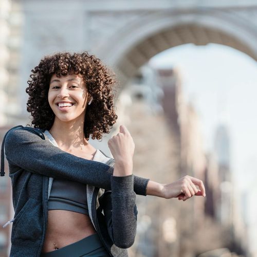 Active woman enjoying her morning routine with energy